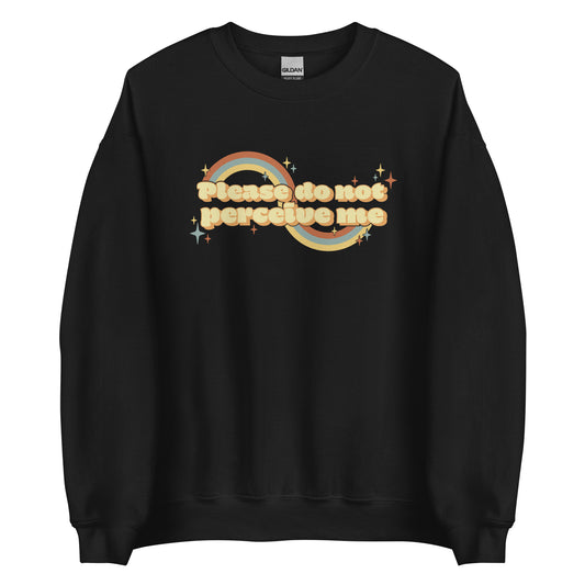 A black crewneck sweatshirt featuring vintage-style text that reads "Please do not perceive me". A colorful swirl and sparkles surrounds the text in red, yellow, and blue.