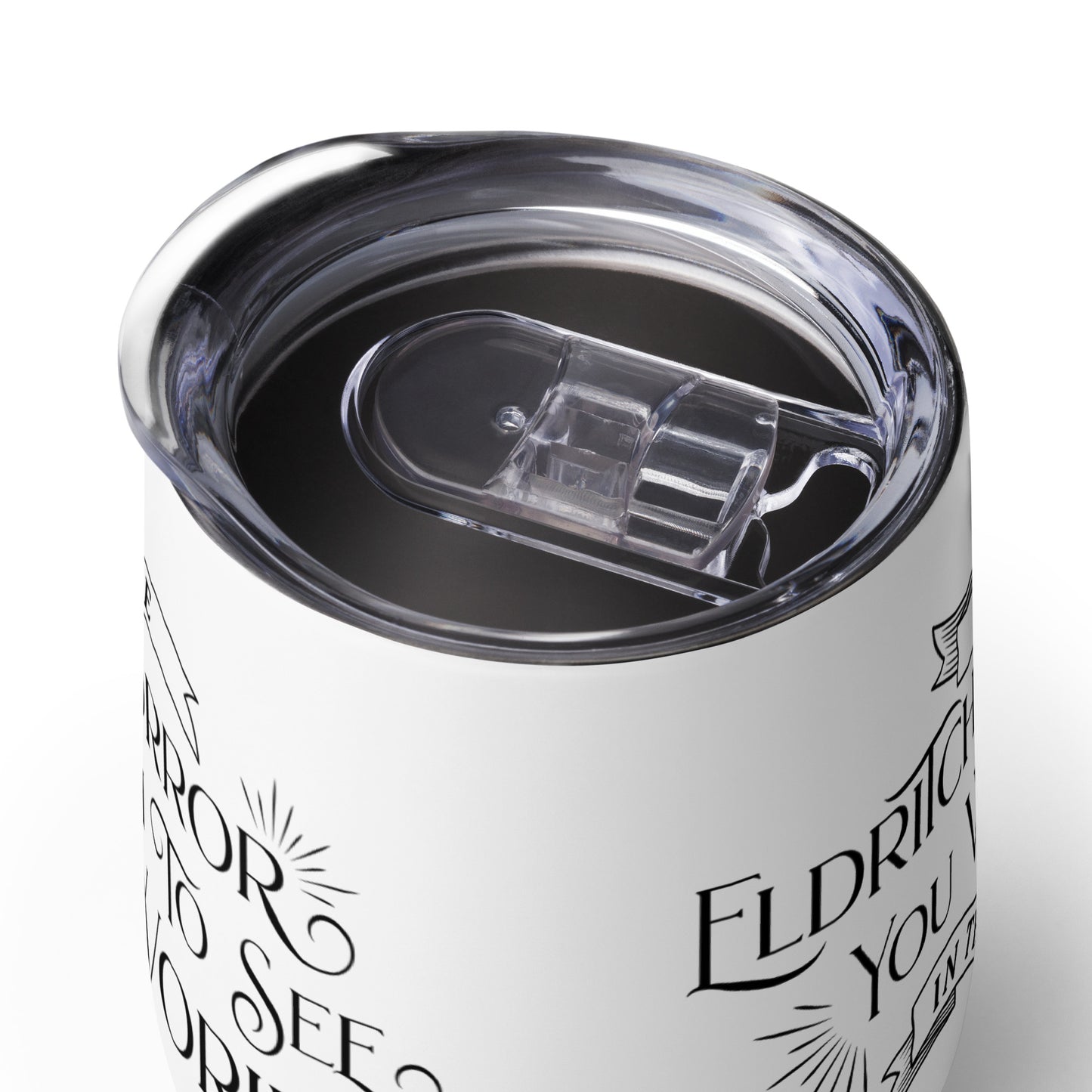 A close up image of the plastic lid of a wine tumbler. The lid features a sliding latch mechanism that allows the lid to close or open.