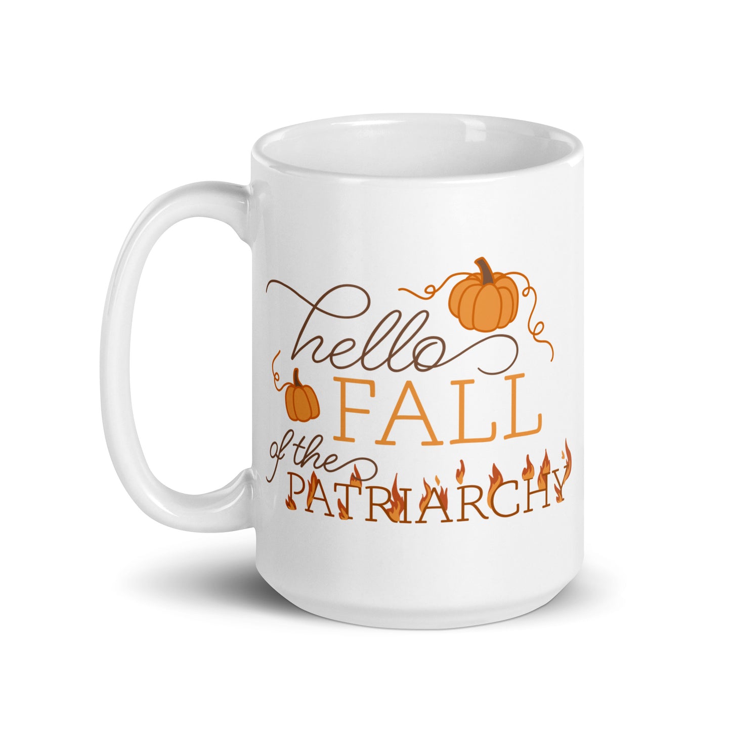 A white ceramic coffee mug featuring text in a blend of cursive and serif fonts that read "hello FALL of the PATRIARCHY". Pumpkins surround the upper half of the text, and the word "Patriarchy" is surrounded by flames.
