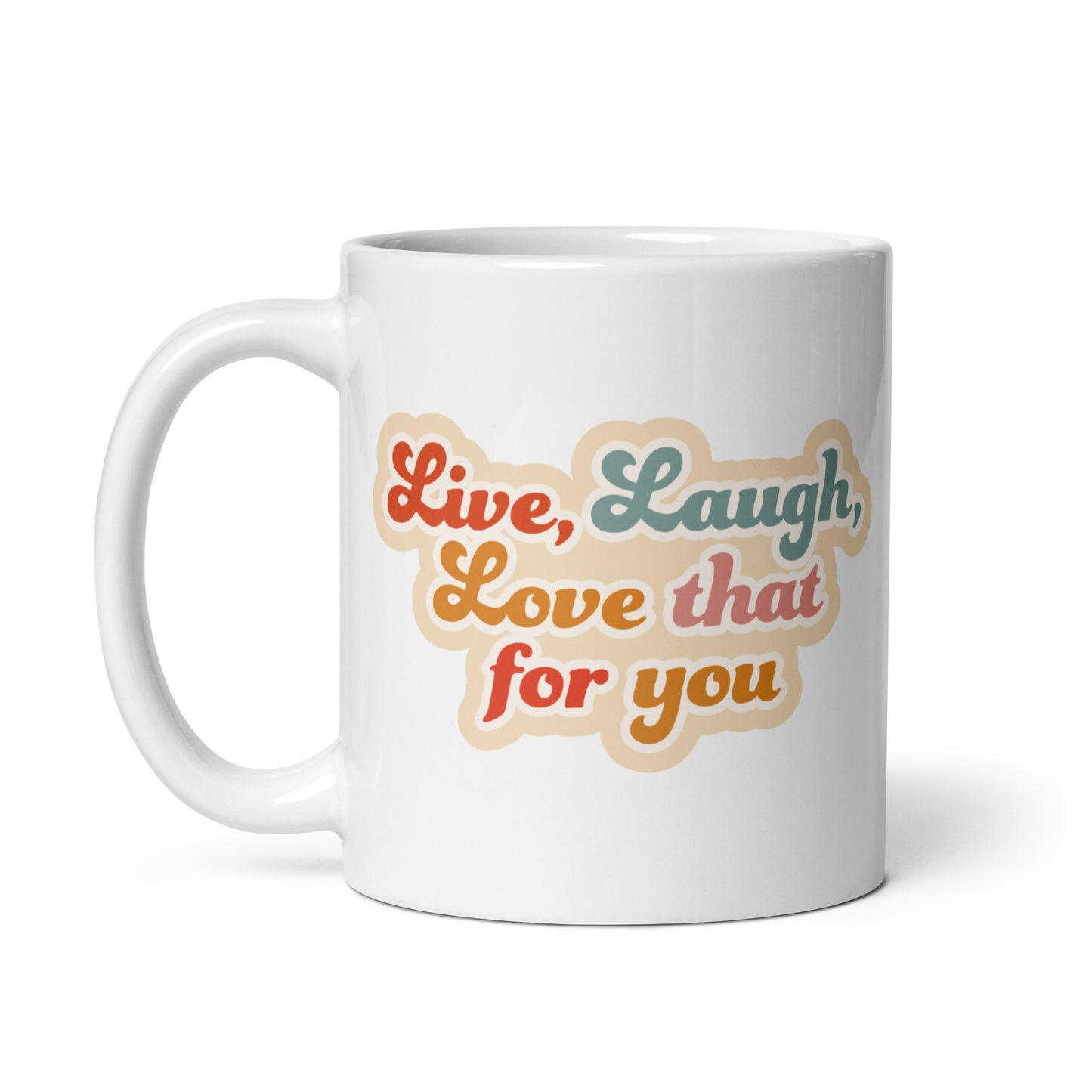 A white 11 ounce cereamic coffee mug featuring colorful, cursive text that reads "Live, Laugh, Love that for you."
