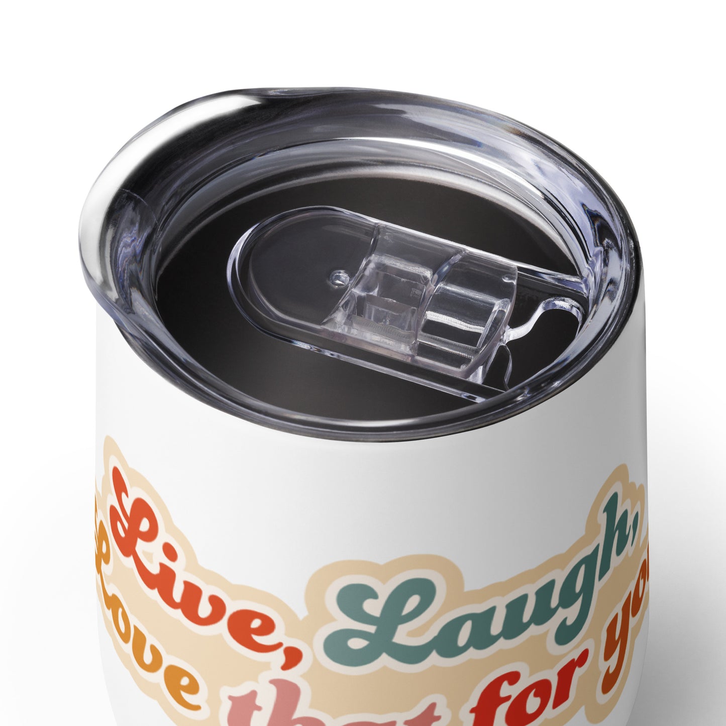A close-up view of the lid of a white whine tumbler. The lid has a sliding latch that allows access to the lid's opening.