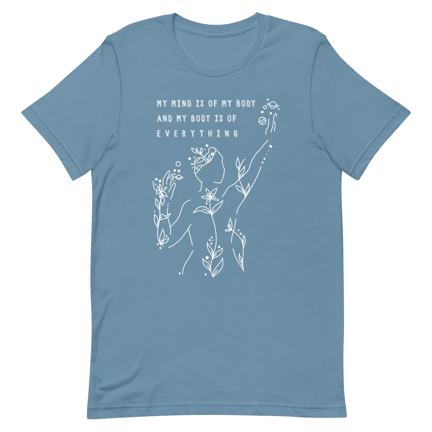 A blue crewneck t-shirt, featuring an abstract illustration of a figure whose body is spreading out into plants and planets and stars. Text above the figure reads "My mind is of my body and my body is of everything."