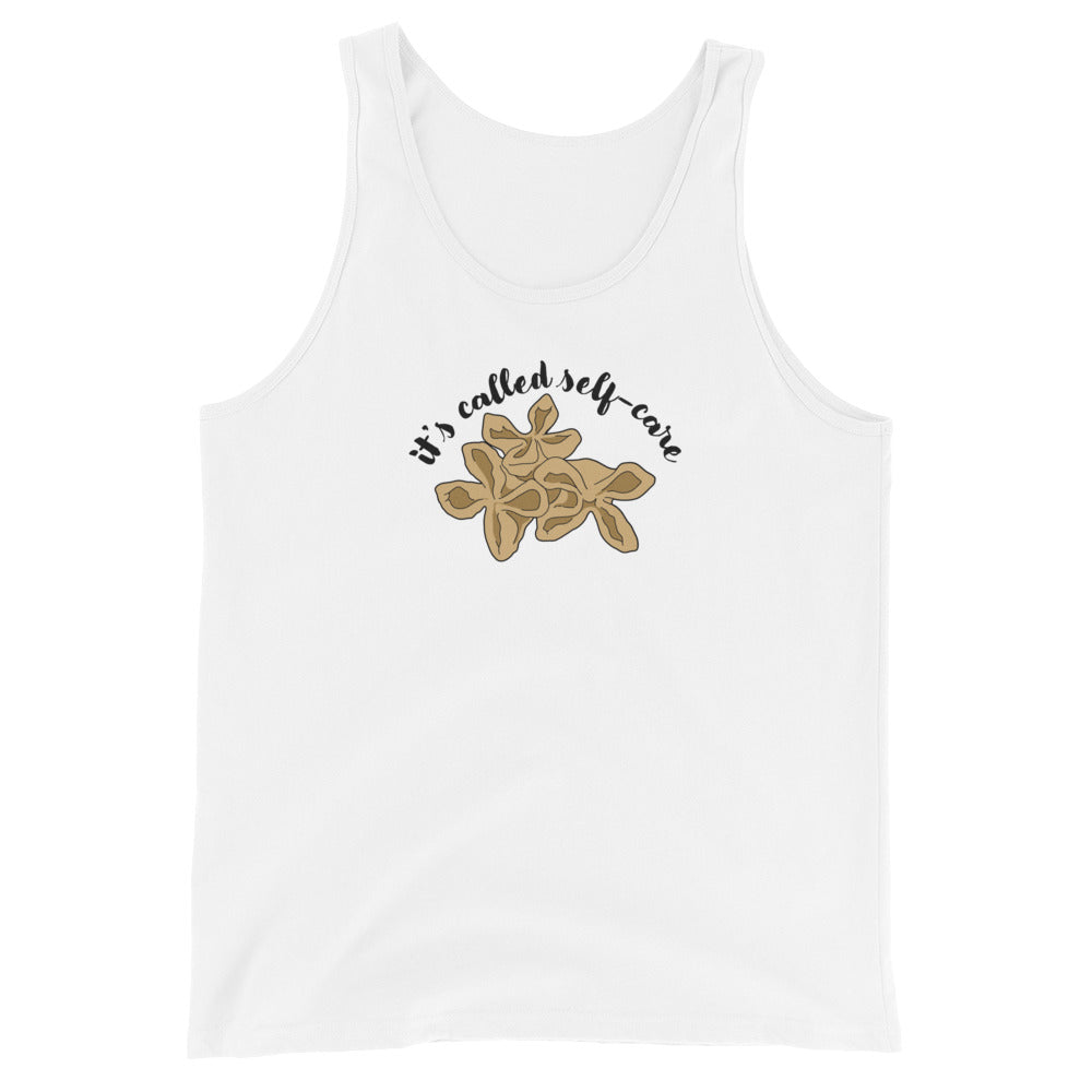 A white tank top featuring an illustration of three pieces of crab rangoon. Text in an arc above the crab rangoon reads "it's called self-care" in a cursive script.