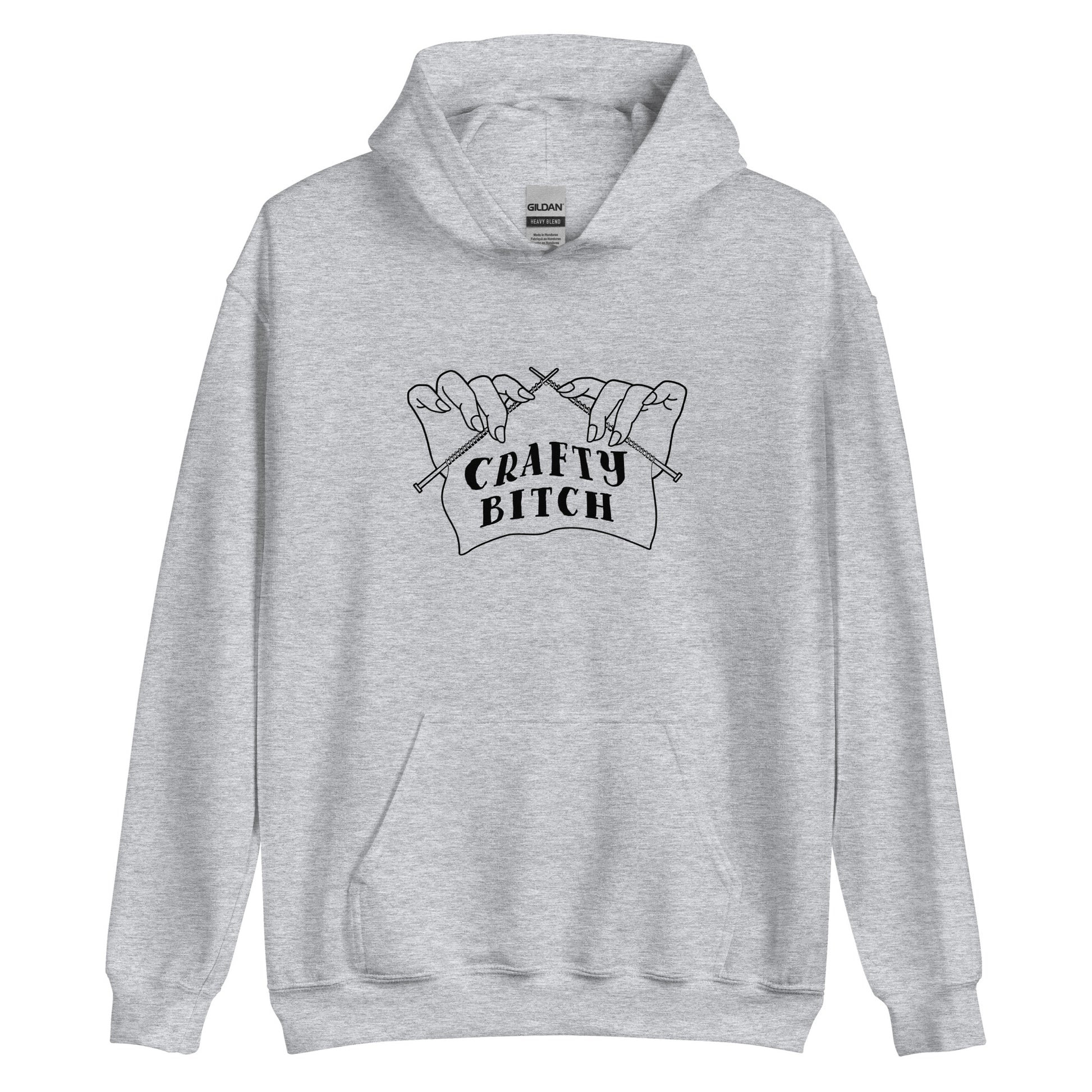 A grey hooded sweatshirt featuring a single-color illustration of a pair of hands holding knitting needles. Fabric on the needles features text that reads "crafty bitch".