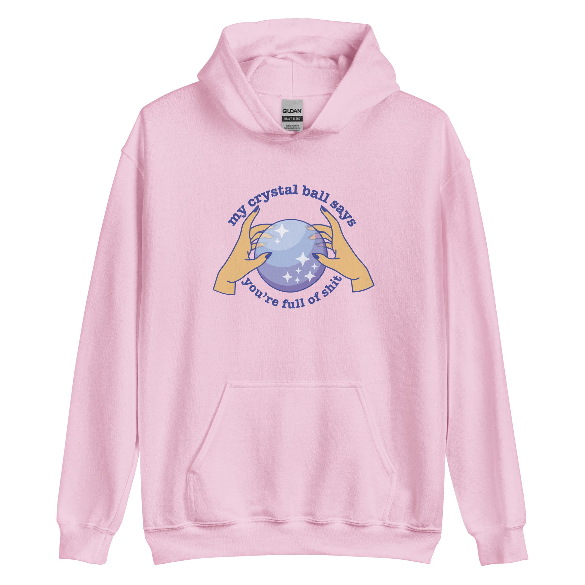 A light pink hoodie with a picture of hands on a crystal ball and text reading "My crystal ball says you're full of shit"