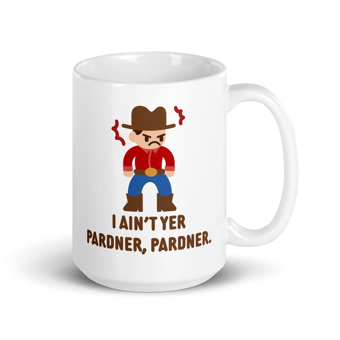 A white 15 ounce ceramic coffee mug featuring an illustration of a grumpy cowboy wearing a red shirt. Text beneath the cowboy reads "I ain't yer pardner, pardner."