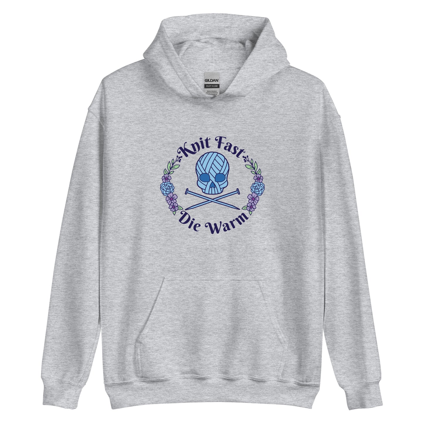 A heather grey hooded sweatshirt featuring an image of a skull and crossbones made of yarn and knitting needles. A floral wreath surrounds the skull, along with words that read "Knit Fast, Die Warm"