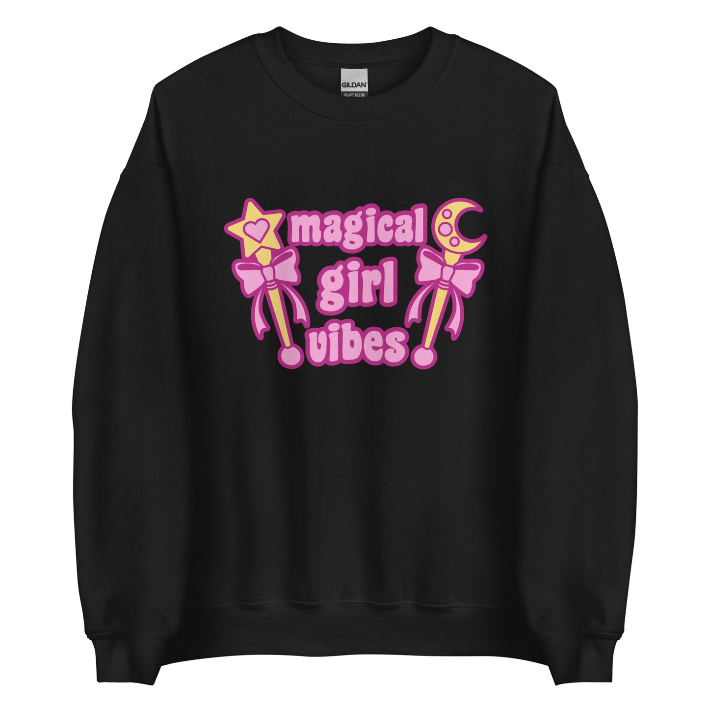 A black crewneck sweatshirt featuring two gold wands with pink bows and pink text reading "Magical girl vibes"