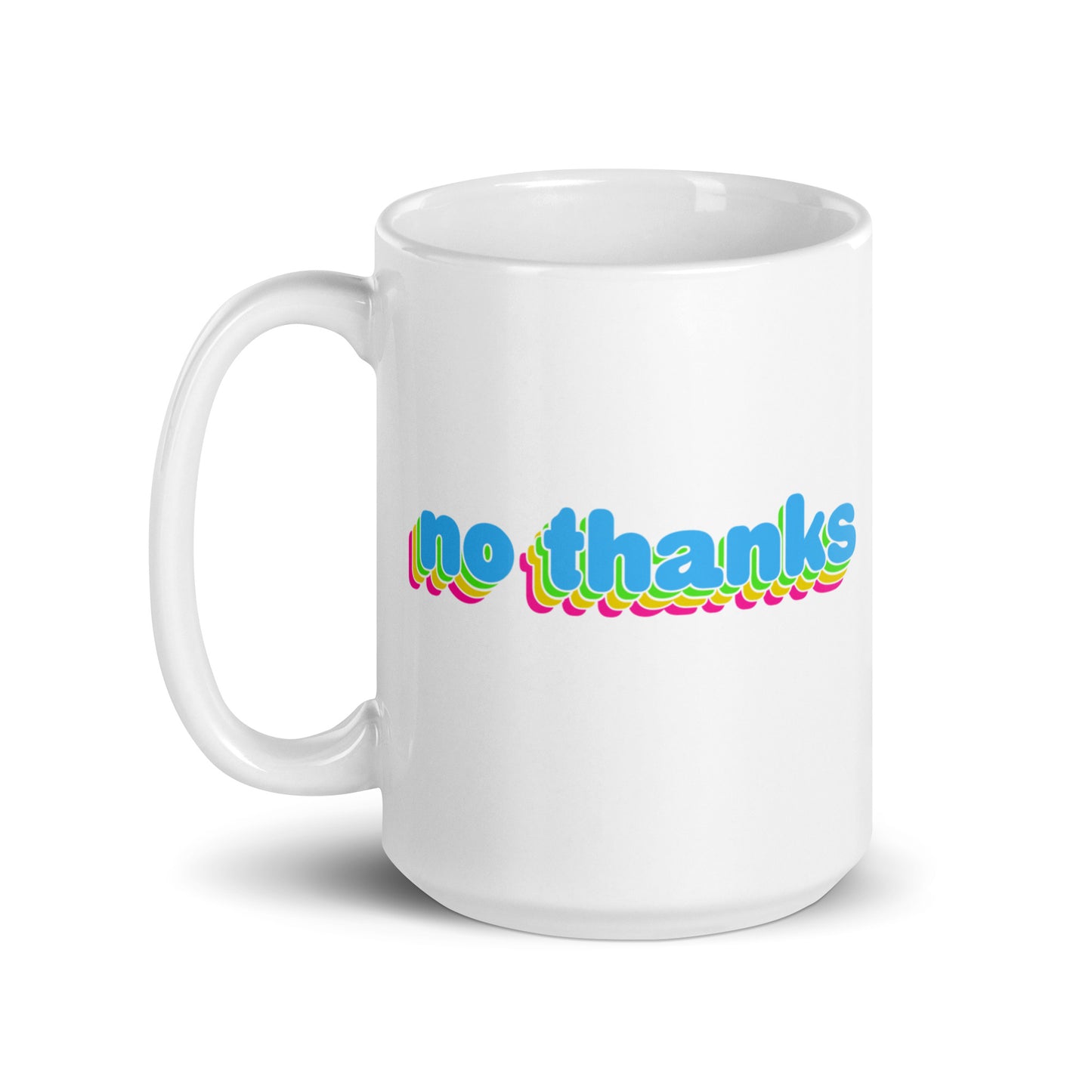 A white 15 oz ceramic mug with the handle to the left featuring colorful bubble text reading "no thanks"