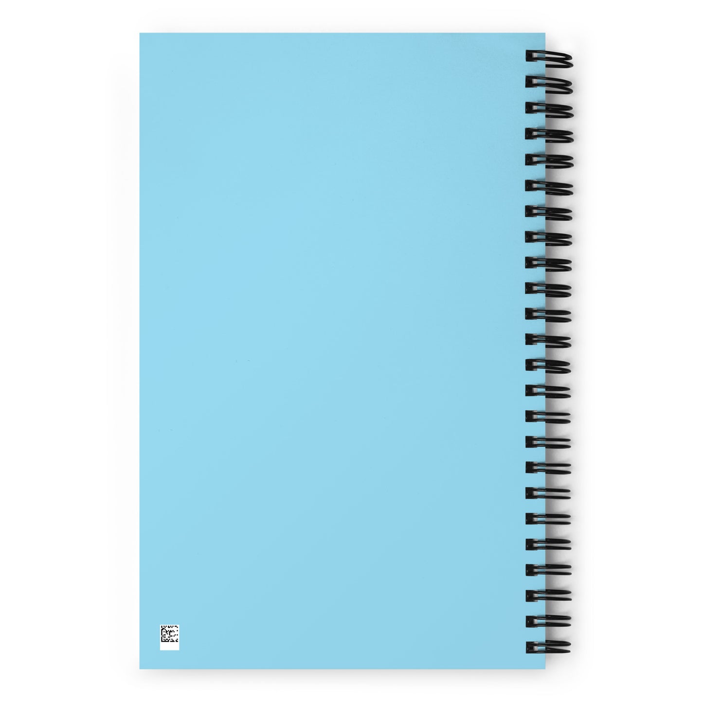 The back side of a light blue o-ring bound notebook.