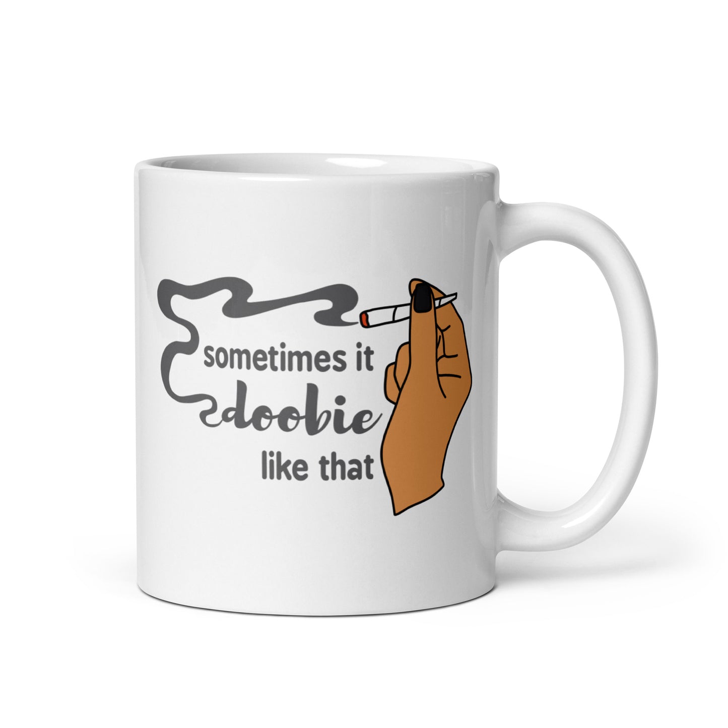 A white 11 ounce coffee mug featuring an illustration of a hand holding a smoking joint. Text alongside the hand reads "Sometimes it doobie like that" with the word "doobie" made of smoke from the joint.