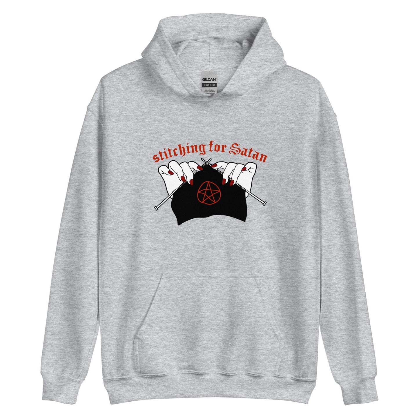 A grey hooded sweatshirt featuring an illustration of pale white hands with red fingernails holding knitting needles. Fabric on the needles features a red pentagram. Text above the hands reads "stitching for Satan" in a gothc red font.