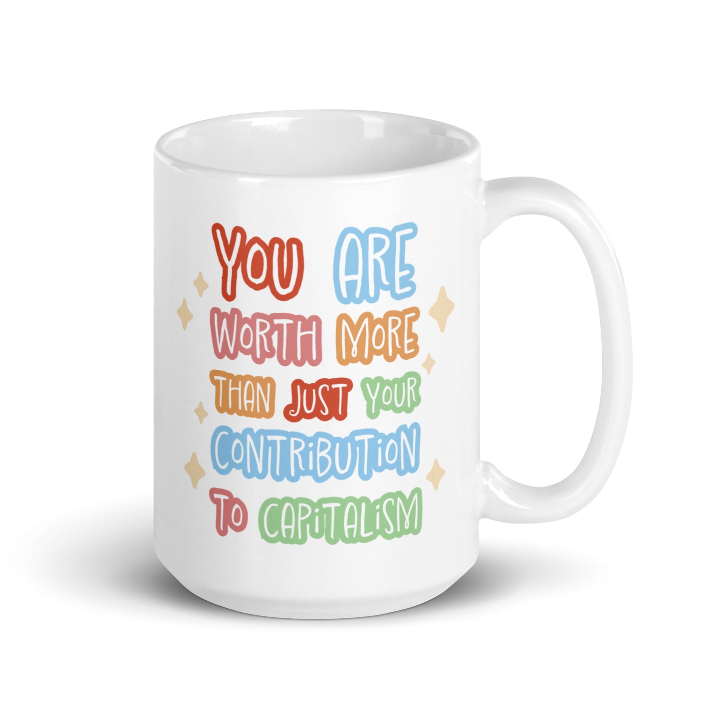 A white ceramic 15 ounce mug featuring colorful hand-written-style text that reads "You are worth more than just your contribution to capitalism". Sparkles surround the text on each side.