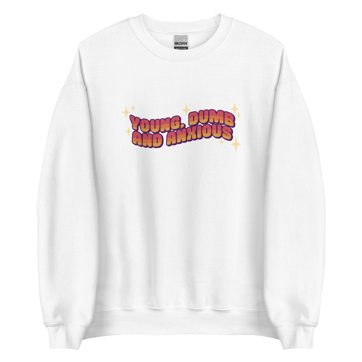 A white crewneck sweatshirt featuring text in a pink-to-yellow gradient, surrounded by sparkles. The text reads "Young, dumb and anxious" in a blocky font.