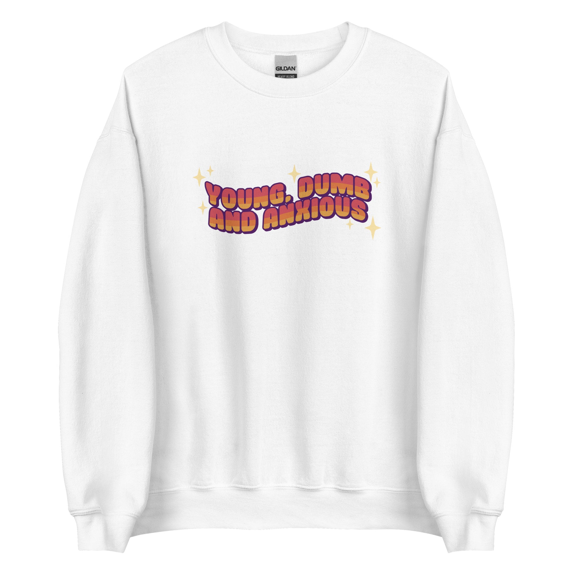 A white crewneck sweatshirt featuring text in a pink-to-yellow gradient, surrounded by sparkles. The text reads "Young, dumb and anxious" in a blocky font.