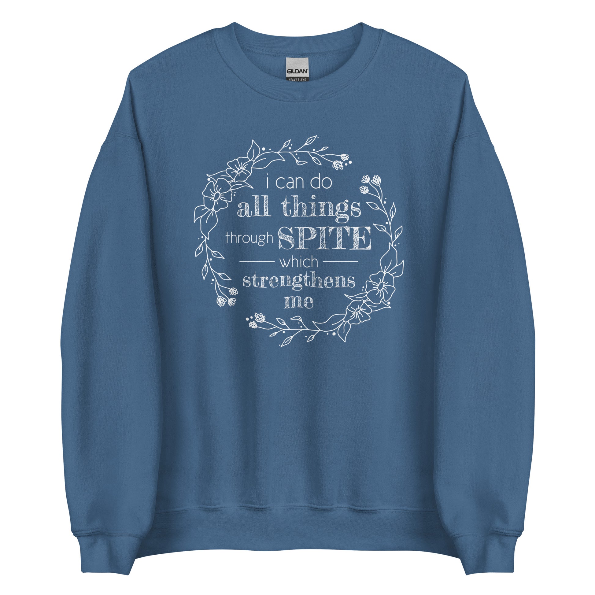 A blue crewneck sweatshirt featuring an illustration of a floral wreath. Text inside the flowers reads "i can do all things through SPITE which strengthens me"