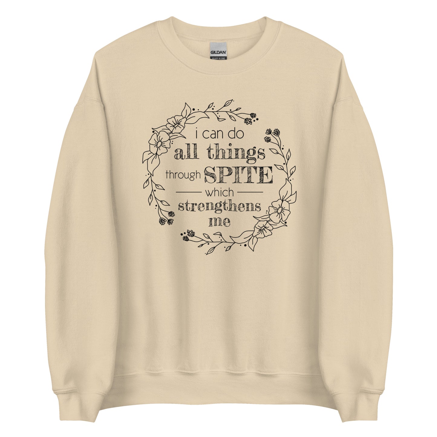 A tan crewneck sweatshirt featuring an illustration of a floral wreath. Text inside the flowers reads "i can do all things through SPITE which strengthens me"