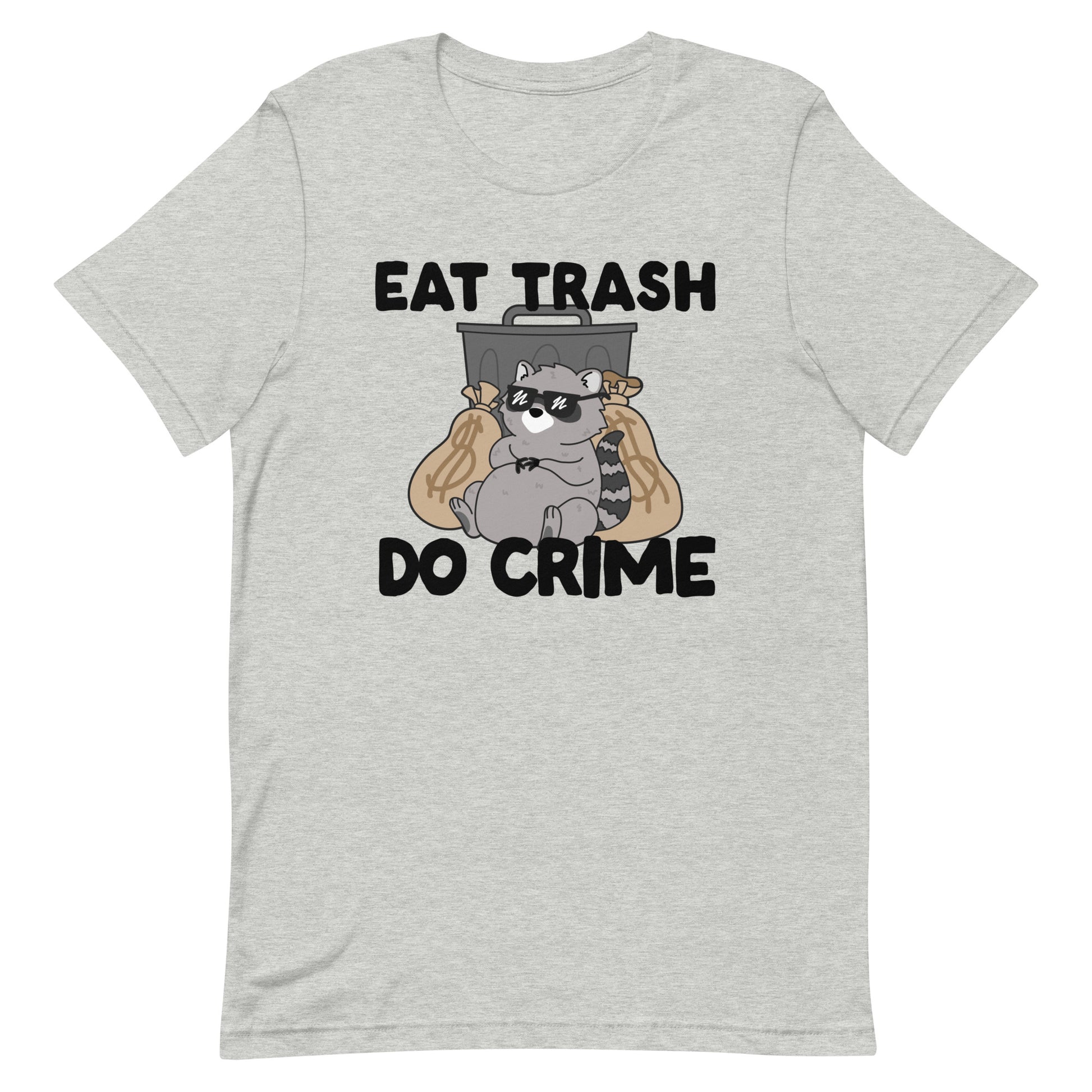 A grey crewneck t-shirt featuing an illustration of a chubby raccoon wearing sunglasses. The raccoon is laying back against a trash can and large bags of money. Text surrounding the image reads "Eat trash. Do crime."