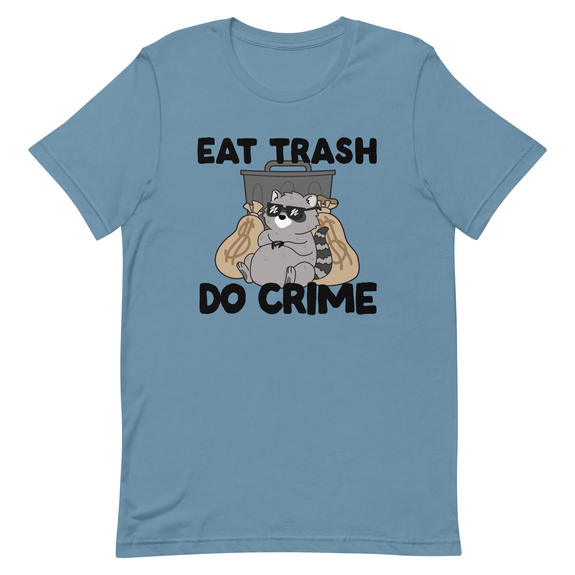 A blue crewneck t-shirt featuing an illustration of a chubby raccoon wearing sunglasses. The raccoon is laying back against a trash can and large bags of money. Text surrounding the image reads "Eat trash. Do crime."