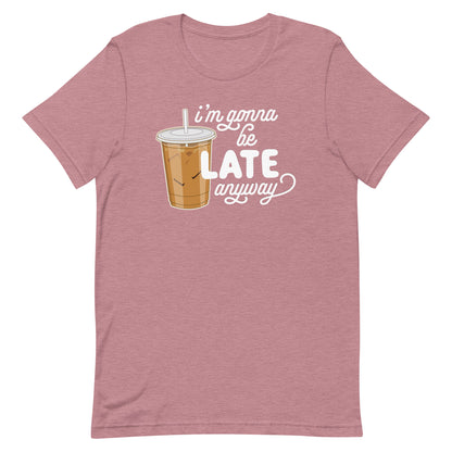 A heathered dusty rose crewneck t-shirt featuring an illustration of iced coffee. Text next to the coffee reads "I'm gonna be LATE anyway".