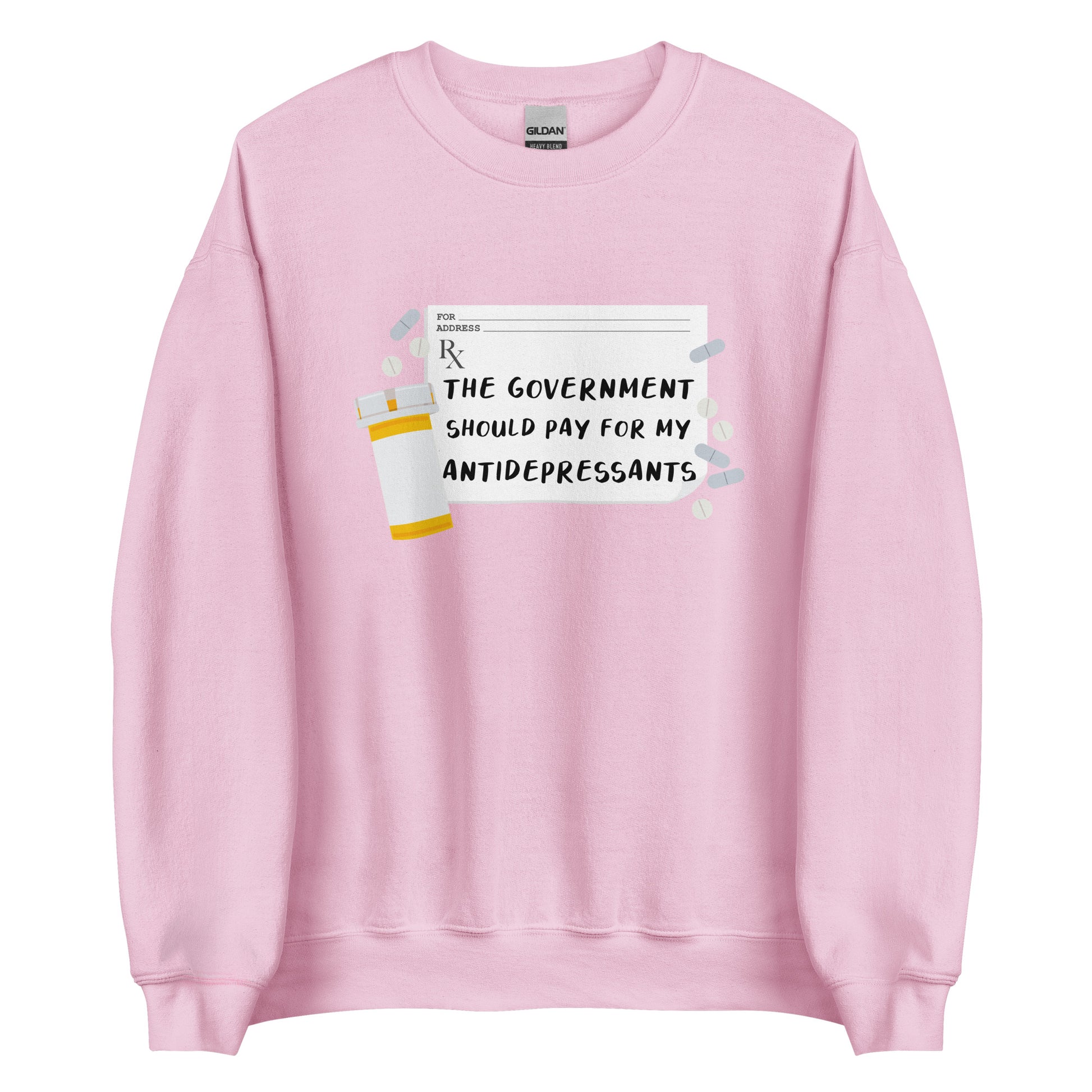 A pink crewneck sweatshirt featuring an image of a subscription page with text that reads "The government should pay for my antidepressants". Pills and an empty orange pill bottle surround the RX sheet.