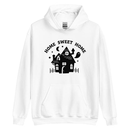 A white hooded sweatshirt featuring a cutesy image of a haunted house. Text above the house reads "HOME SWEET HOME"