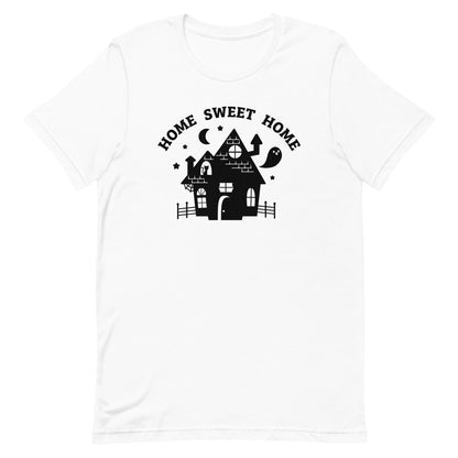 A white crewneck t-shirt featuring a single-color illustration of a haunted house. Text above the house reads "HOME SWEET HOME".