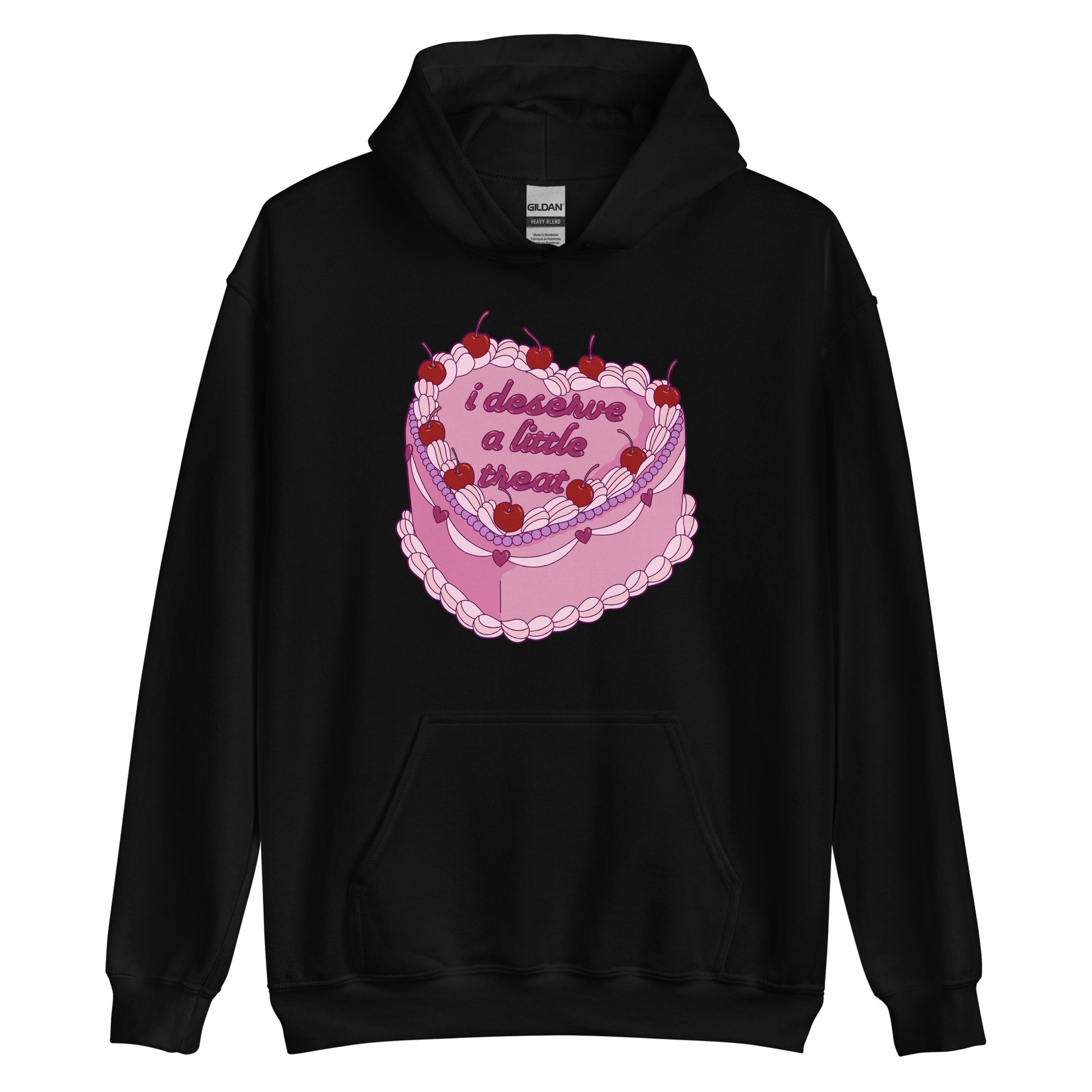 A black hooded sweatshirt featuring an illustration of an elaborately decorated pink cake. Icing on the cake reads "i deserve a little treat" in a cursive font.