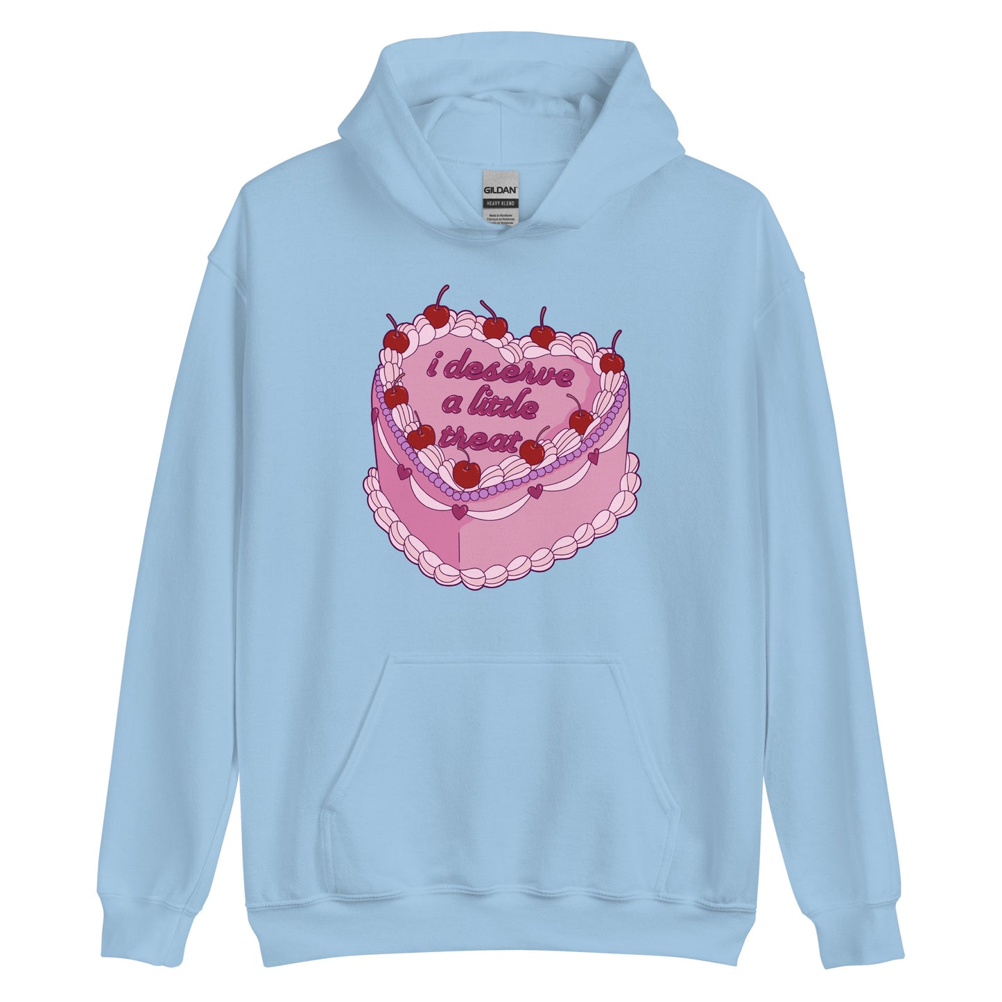 A light blue hooded sweatshirt featuring an illustration of an elaborately decorated pink cake. Icing on the cake reads "i deserve a little treat" in a cursive font.