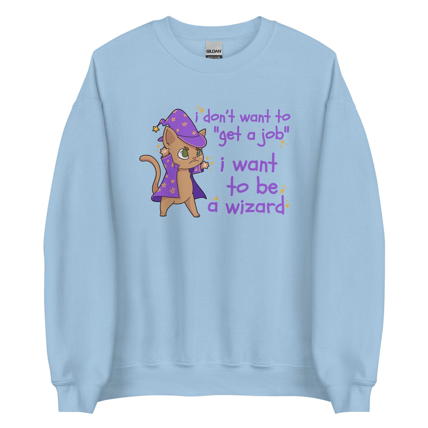 A light blue crewneck sweatshirt featuring an illustration of a small cat wearing wizard robes and a hat. Text alongside the cat reads "i don't want to "get a job". i want to be a wizard."