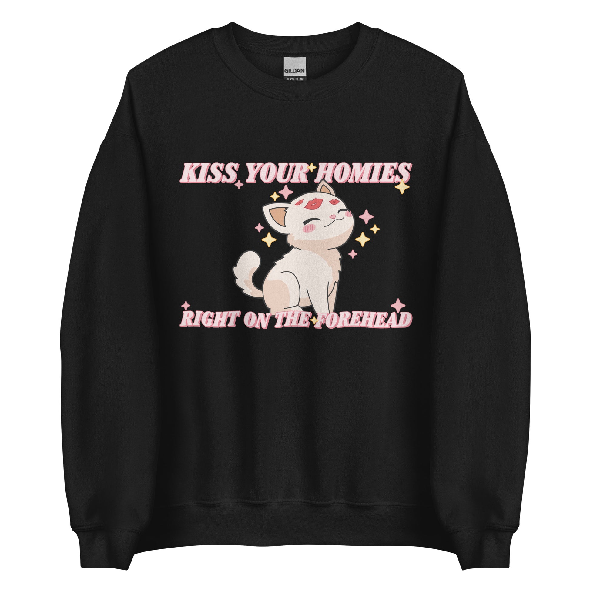 A black crewneck sweatshirt featuring an illustration of a soft white kitten. Lipstick kiss marks are on the kitten's forehead, and its face is surrounded by sparkles. Pink text around the kitten reads "Kiss your homies right on the forehead."