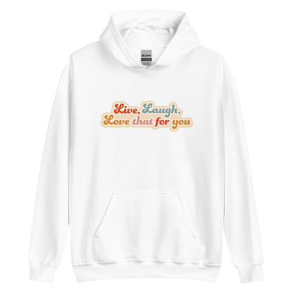 A white hooded sweatshirt featuring colorful, cursive text that reads "Live, Laugh, Love that for you."