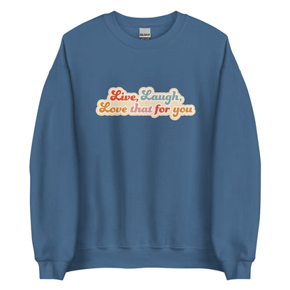 A blue crewneck sweatshirt featuring colorful, cursive text that reads "Live, Laugh, Love that for you"