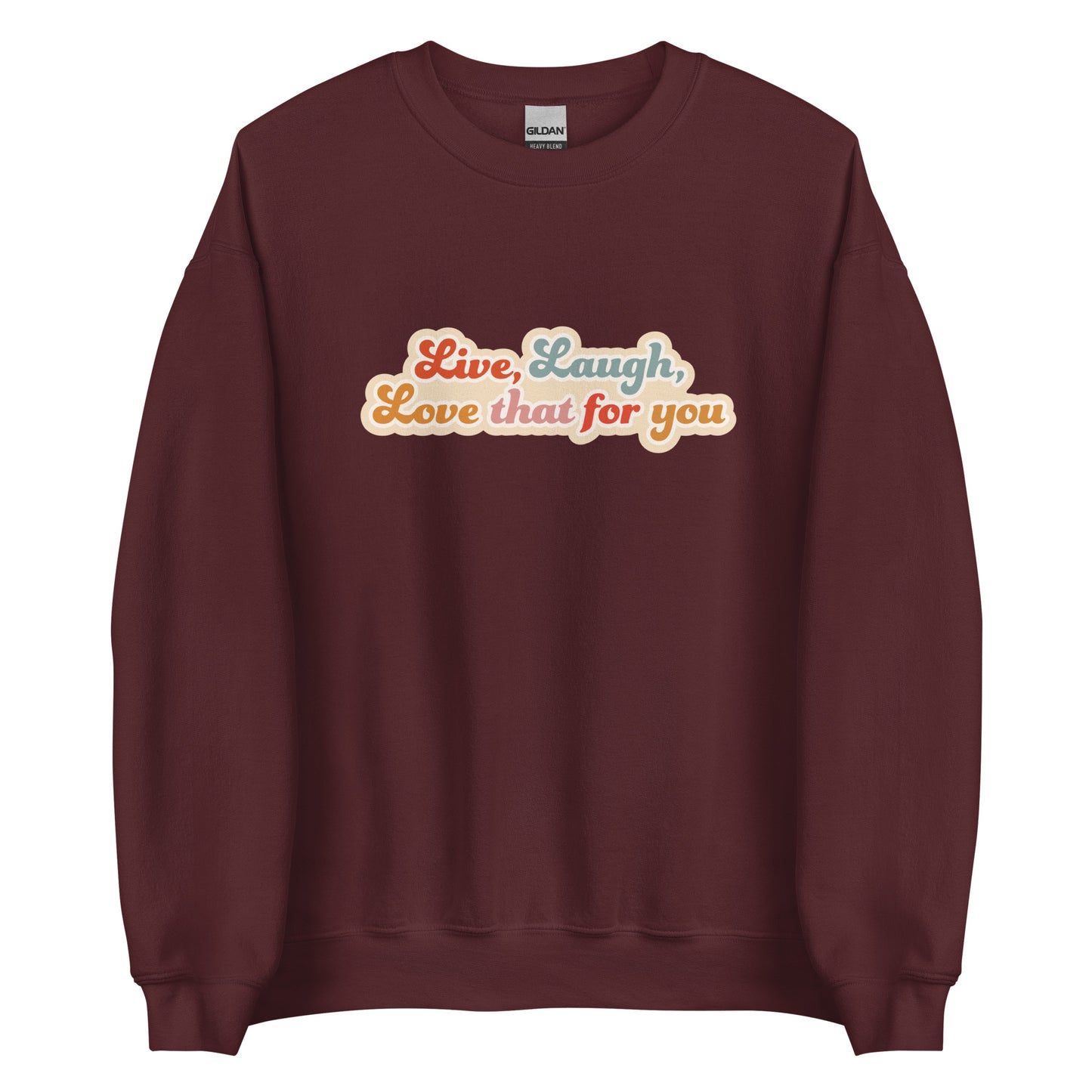 A maroon crewneck sweatshirt featuring colorful, cursive text that reads "Live, Laugh, Love that for you"
