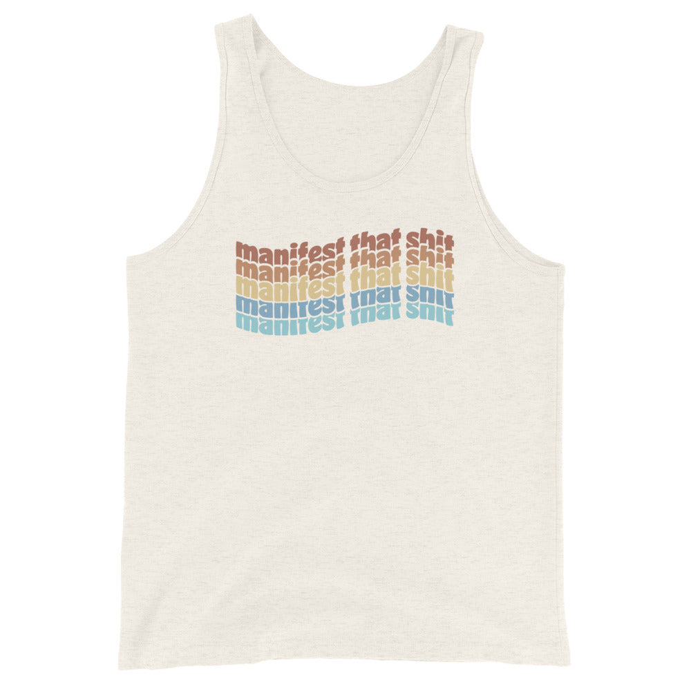 A light cream-colored tank top featuring stacked text that reads "manifest that shit" in a rainbow of colors.