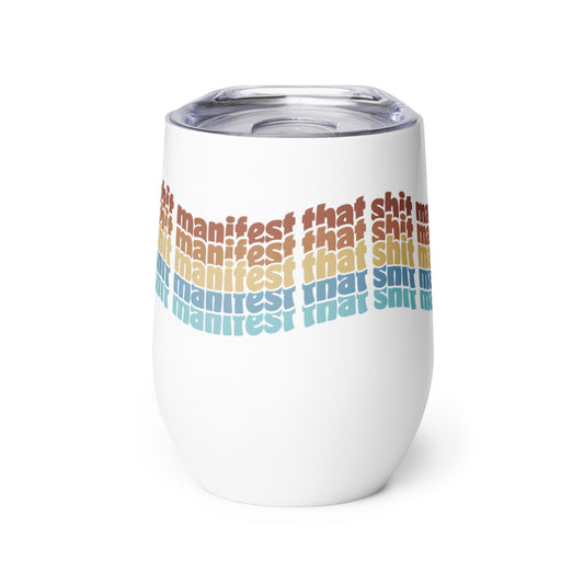 A white wine tumbler with a plastic lid. Rainbow stacked text wraps around the tumbler and reads "manifest that shit".