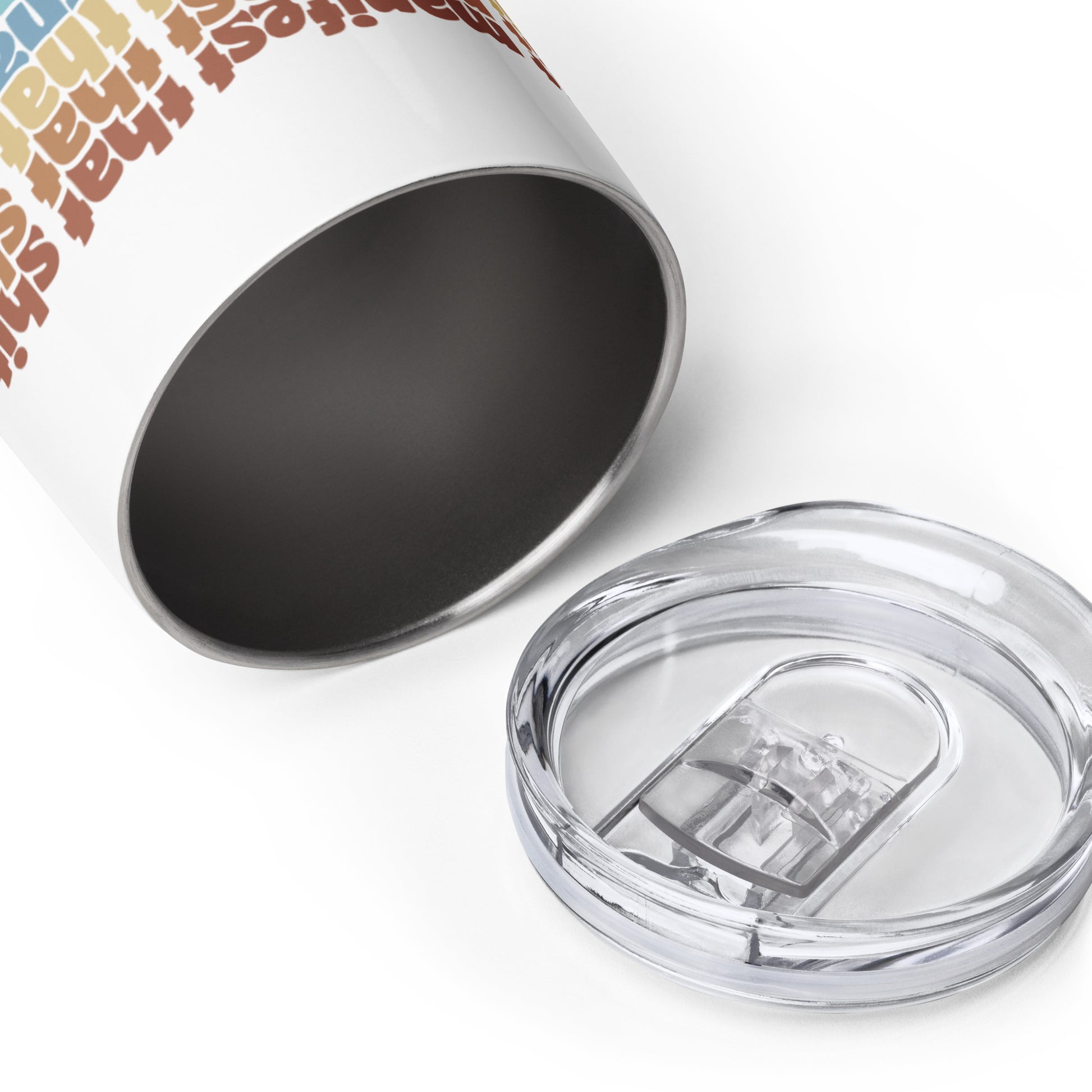 A close-up image of a wine tumbler, laying open on its side. The tumbler's plastic lid is laying next to the tumbler.