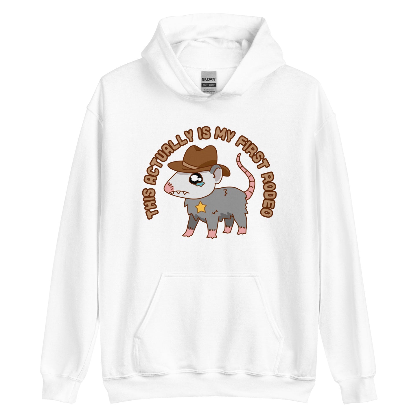 A white hooded sweatshirt featuring an illustration of a cute and nervous possum wearing a cowboy hat and sherrif's star badge. Text above the possum in an arc reads "this actually is my first rodeo".