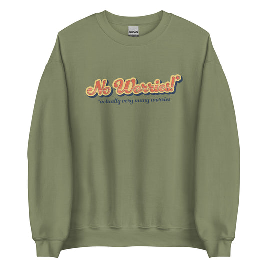 An olive green crewneck sweatshirt featuring vintage-style text that reads "No worries!* *actually very many worries"