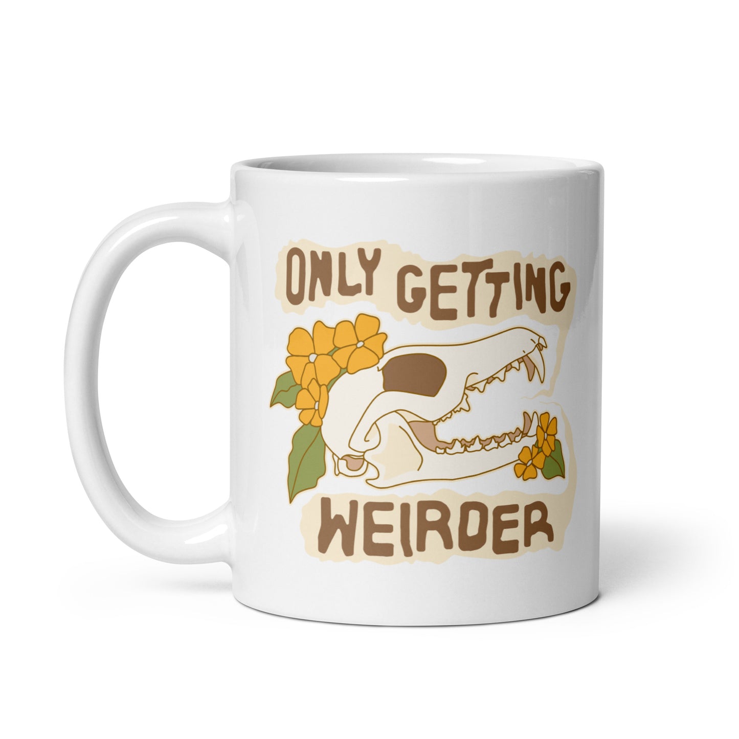 A white ceramic mug featuring an illustration of a fox skull surrounded by yellow flowers. Wobbly speech bubbles are coming from the fox's mouth. The text inside the bubbles reads "ONLY GETTING WEIRDER".