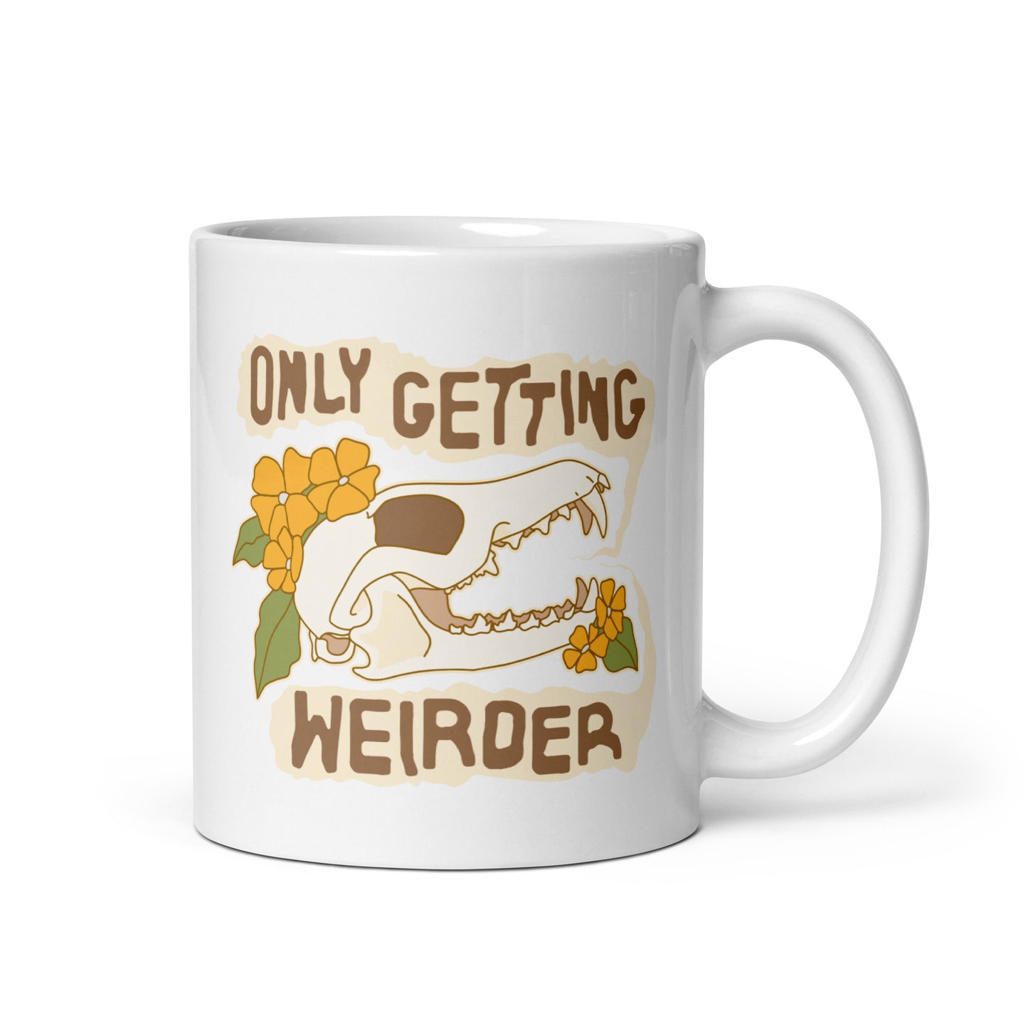 A white ceramic mug featuring an illustration of a fox skull surrounded by yellow flowers. Wobbly speech bubbles are coming from the fox's mouth. The text inside the bubbles reads "ONLY GETTING WEIRDER".