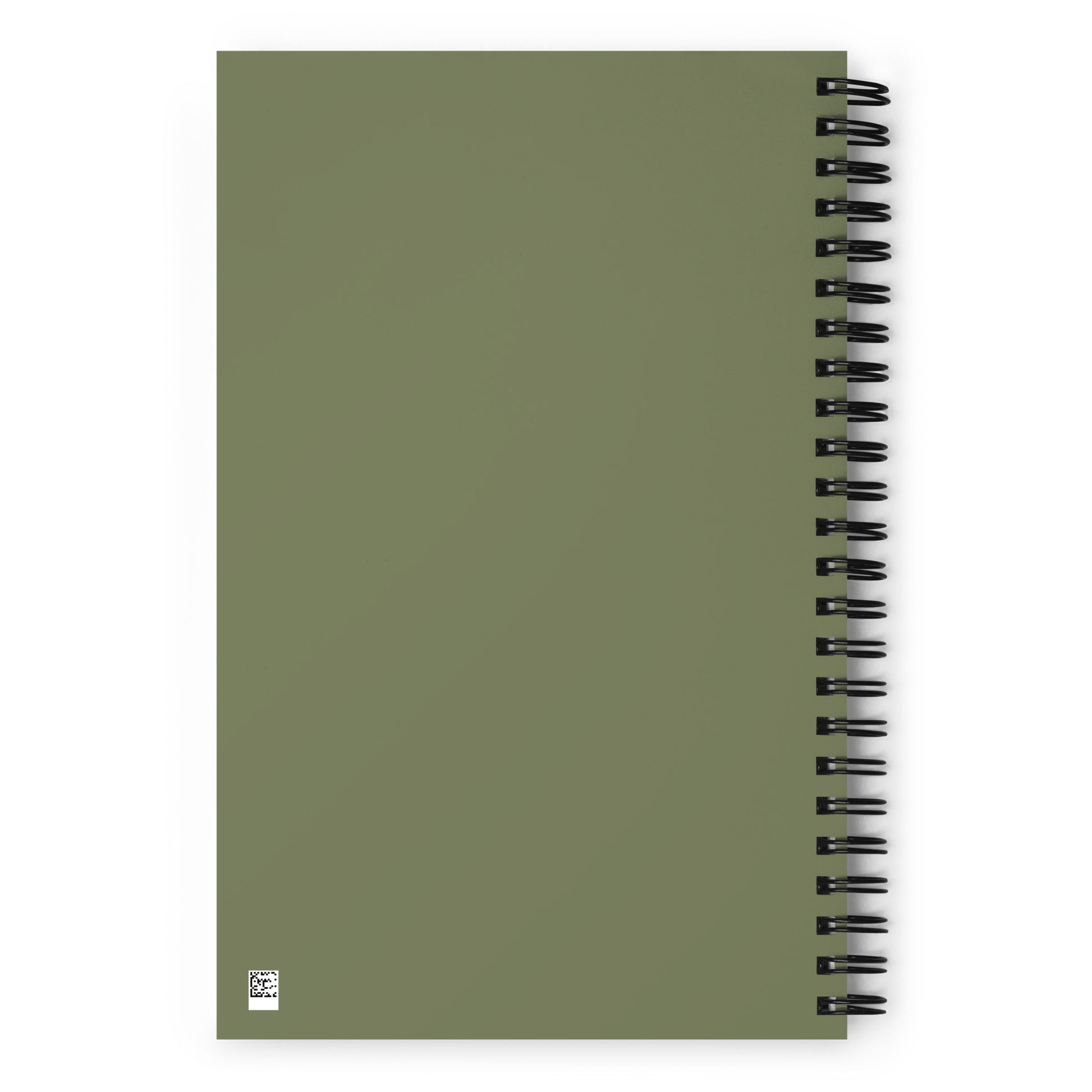 The back side of an olive green notebook bound with black o-ring wires.
