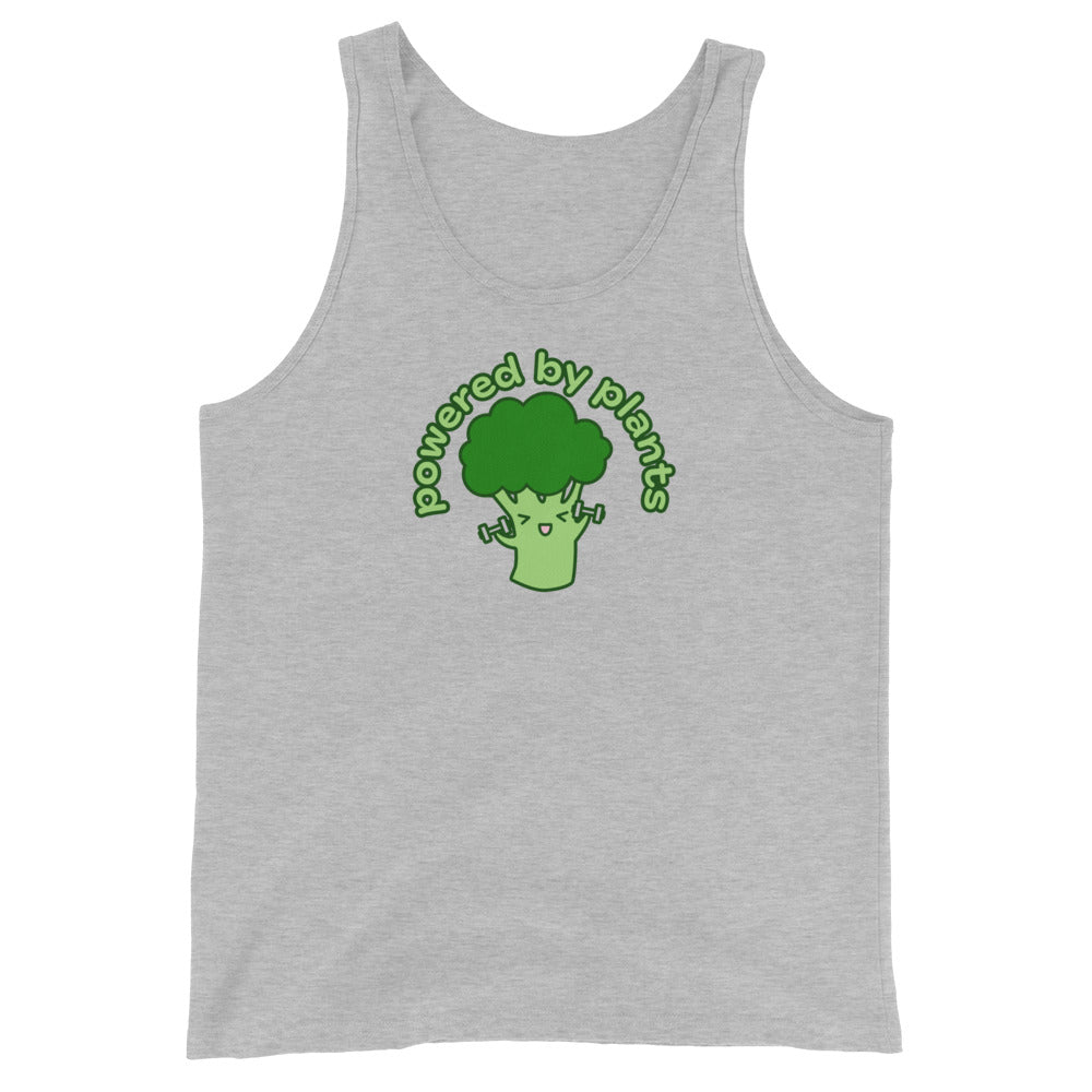 A grey tank top featuring an illustration of a cute broccoli smiling and lifting weights. Text above the broccoli in an arc reads "Powered By Plants"
