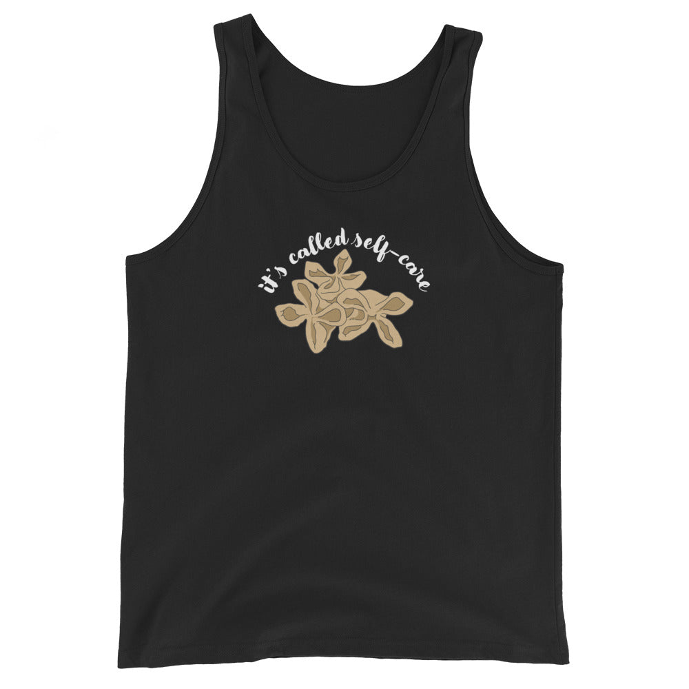 A black tank top featuring an illustration of three pieces of crab rangoon. Text in an arc above the crab rangoon reads "it's called self-care" in a cursive script.