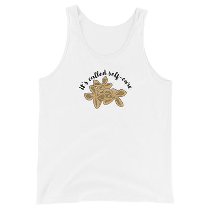A white tank top featuring an illustration of three pieces of crab rangoon. Text in an arc above the crab rangoon reads "it's called self-care" in a cursive script.