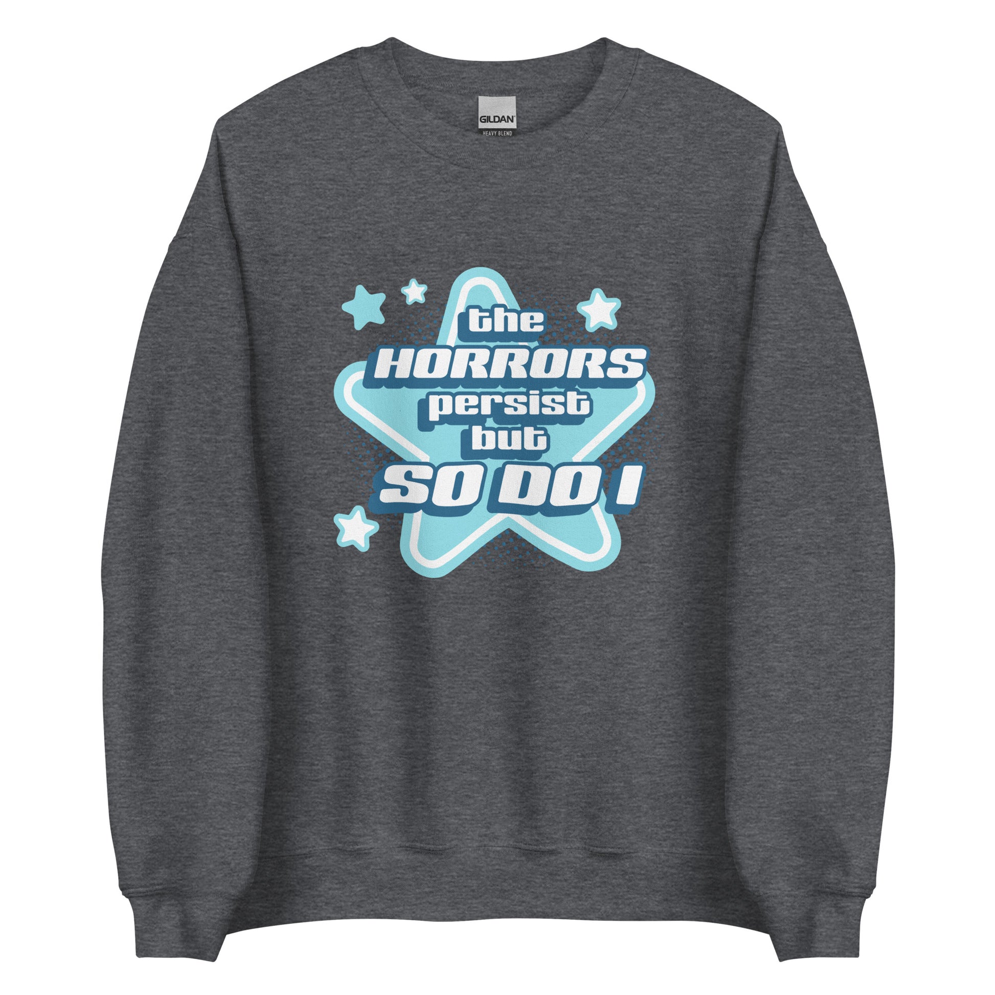 A dark heathered grey crewneck sweatshirt featuring blue and white stars over a halftone pattern with chunky text that reads "the horrors persist but so do i".