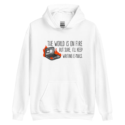 A white hooded sweatshirt featuring a squiggly illustration of a laptop that is on fire. Text alongside the laptop reads "the world is on fire but sure, I'll keep writing e-mails."