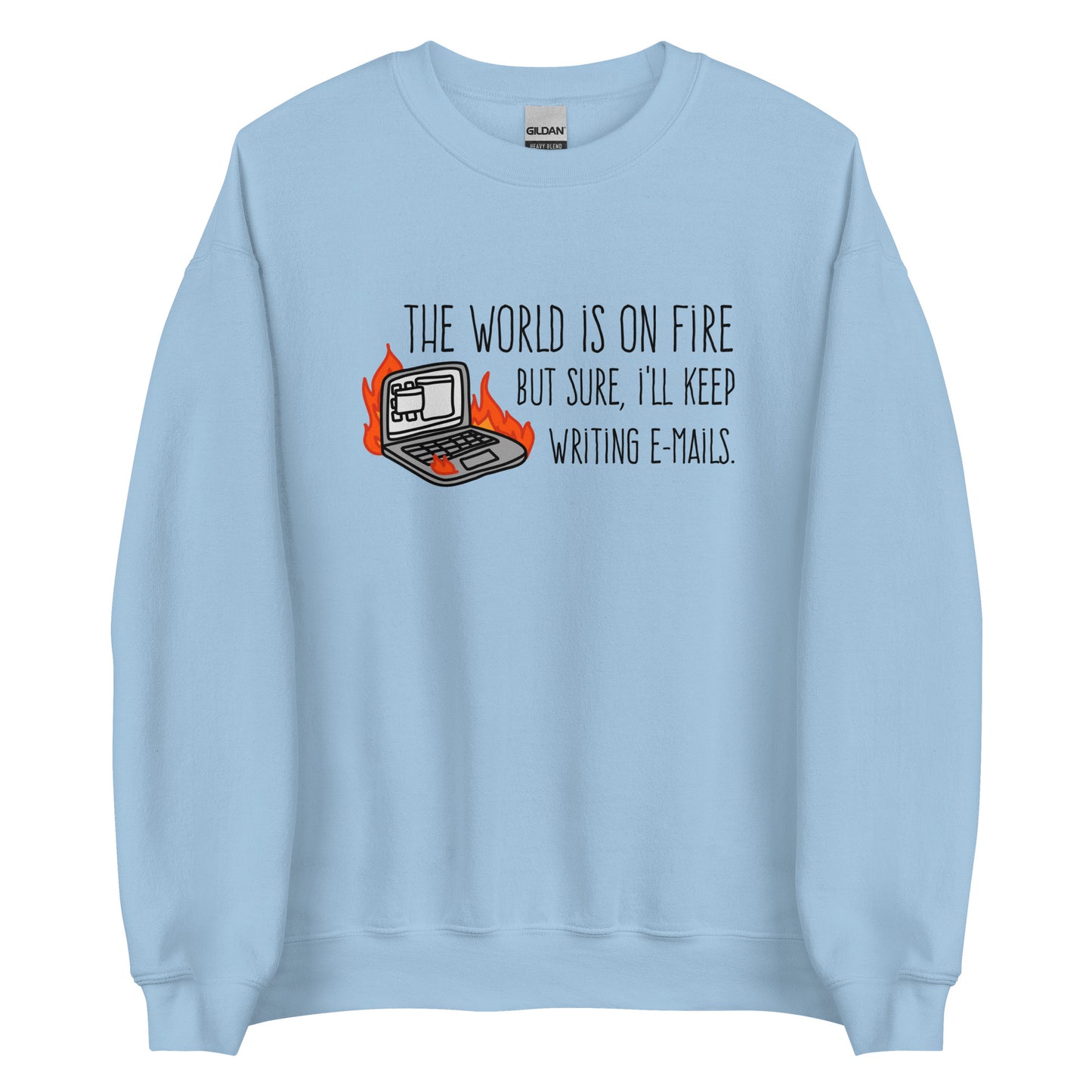 A light blue crewneck sweatshirt featuring a squiggly illustration of a laptop that is on fire. Text alongside the laptop reads "the world is on fire but sure, I'll keep writing e-mails."