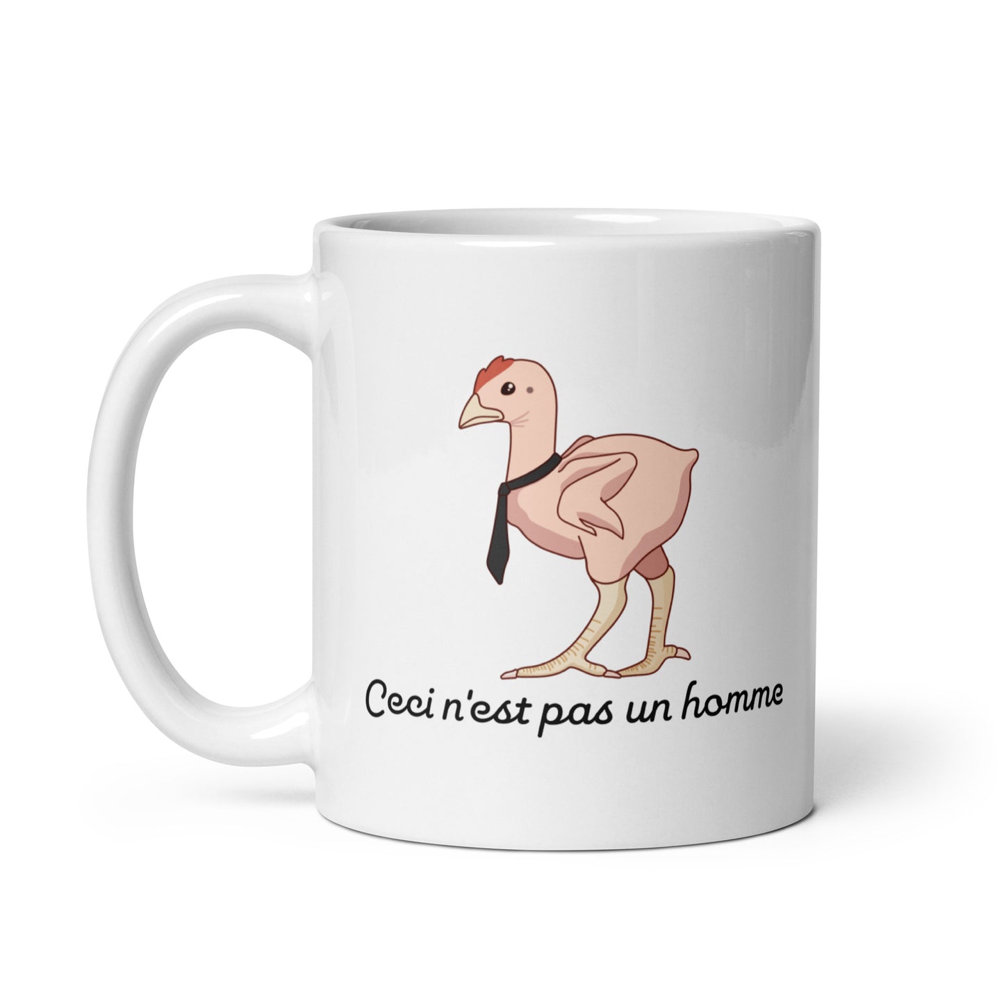 An 11 ounce ceramic mug featuring an illustration of a featherless chicken wearing a tie. Text underneath the chicken reads "Ceci n'est pas un homme" in a cursive font.