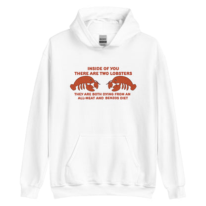 A white hooded sweatshirt featuring an illustration of two lobsters. Text around the lobster reads "Inside Of You There Are Two Lobsters" "They are both dying from an all-meat and benzos diet."